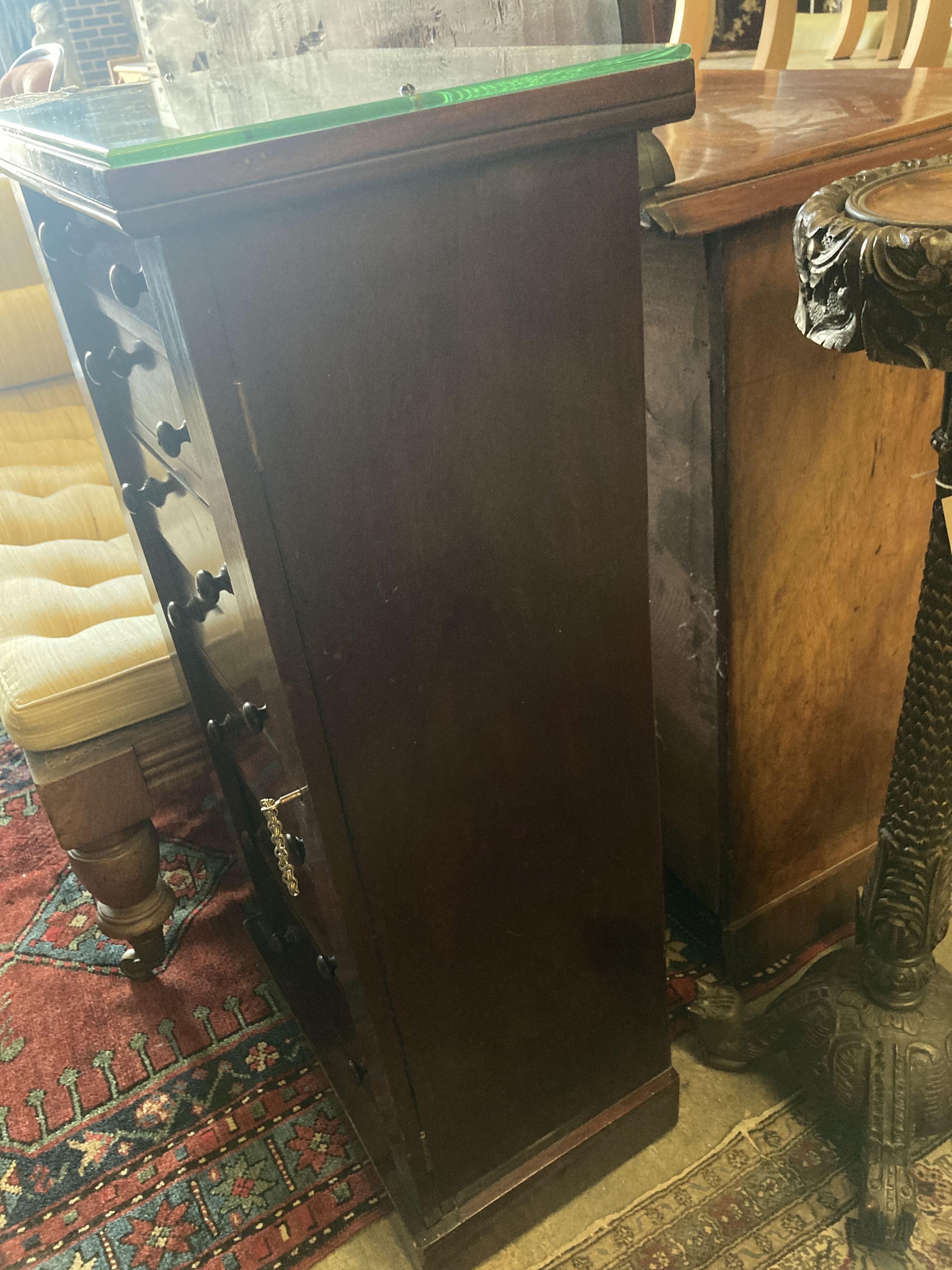 A Victorian mahogany Wellington chest, width 50cm, depth 35cm, height 104cm